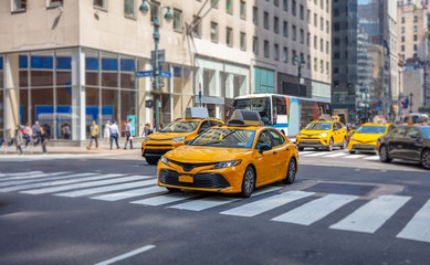 New York, streets. High buildings, cars and cabs