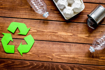 Eco concept with recycling symbol on table background top view mock-up