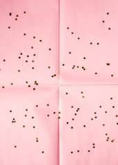 Pink coral wrapping paper background with star confetti. Geometry festive abstract art concept backdrop.