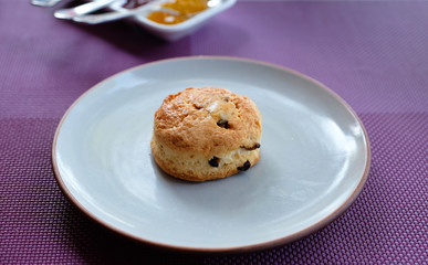 butter scone with fruit jam