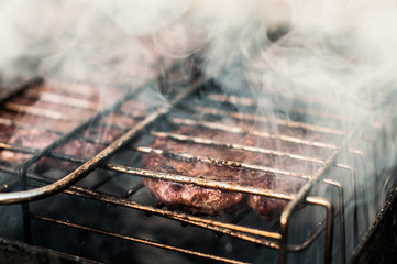 A delicious steak cooking on barbecue