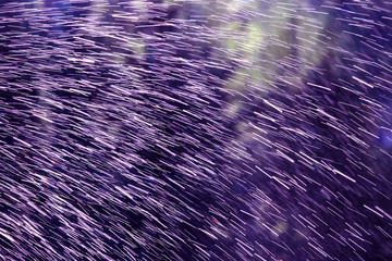 the spray of the fountain on blurred background