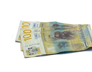 Three  banknotes worth 10 Serbian Dinars with a portrait of a Linguist Vuk Karadzic isolated on a white background