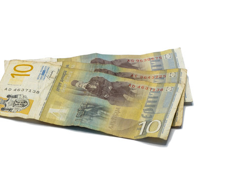 Three  banknotes worth 10 Serbian Dinars with a portrait of a Linguist Vuk Karadzic isolated on a white background