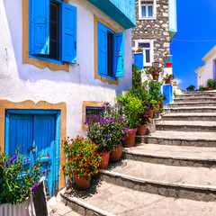 Fototapeta na wymiar Tradiyonal colorful Greece series - charmng streets of Kokkari village in Samos island
