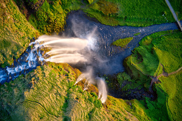 Dramatic top view of waterfall peak, Iceland
