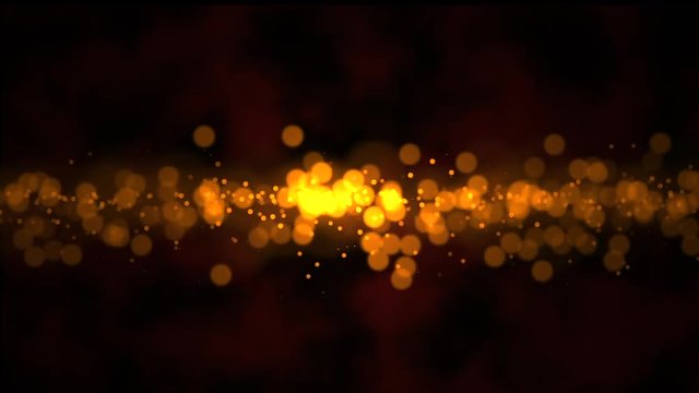 Abstract golden particles background with small bokeh. Glamour sparkly holiday and wedding background.