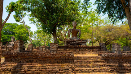 Fototapeta na wymiar Buddha statue made Made from cement ,in World heritage Kamphaeng Phet historical park, Thailand