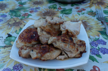 grilled salmon steak with vegetables on plate