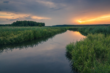 Naklejka na ściany i meble Sunrise over the backwaters Luciaza river near Sulejow, Lodzkie, Poand