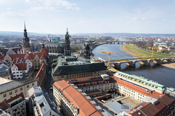Fototapeta na wymiar Aerial view of Dresden cathedral of the Holy Trinity with Augustus bridge over Elbe in Dresden, Germany, sunny spring day