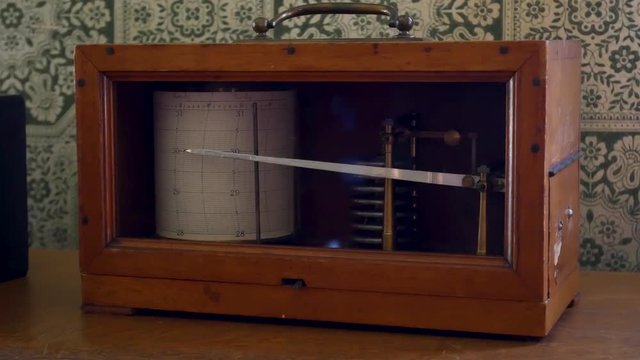 Antique seismograph on old desk