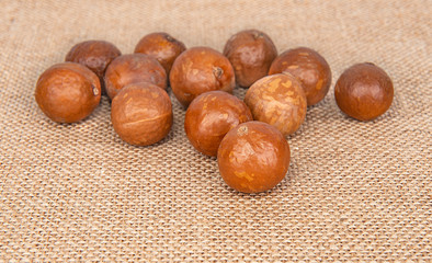 Macadamia nut on sack background