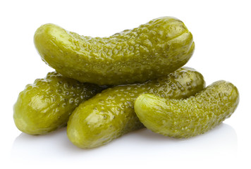 Delicious marinated pickled cucumbers, isolated on white background