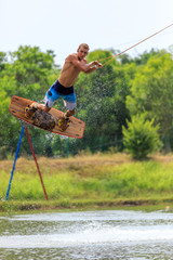 Man Wakeboarding. Jumping