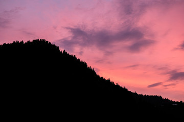 Amazing caucasus mountains. Colorful pink sunset. Silhouettes of the mountains. Khulo village, Adjara region, Georgia. 
