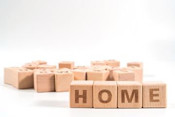 Fototapeta premium word HOME on wood cube dices on white background.