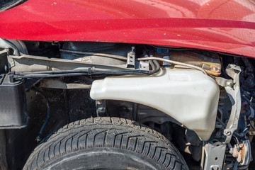 Front side of broken and damaged car in traffic crash accident with fatal outcome in collision