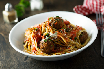 Homemade pasta with meatballs and tomato sauce