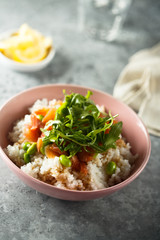 Healthy rice bowl with smoked salmon