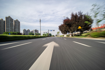 Fototapeta na wymiar high speed view of empty asphalt road