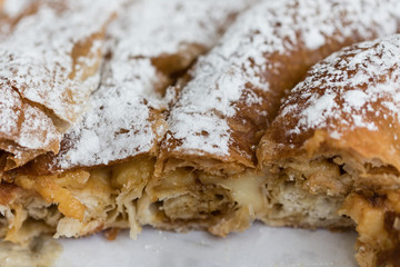 Ensaimada, typical dessert from Mallorca, Spain, filled with cream.