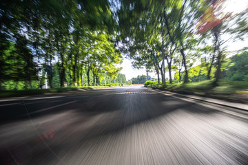 high speed view of empty asphalt road