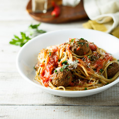 Homemade pasta with meatballs and tomato sauce