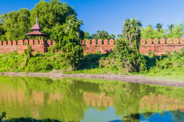 Walls and a moat of the ancient town Inwa (Ava) near Mandalay, Myanmar