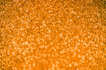 Bright sparkle turmeric background. Holiday and festive concept.