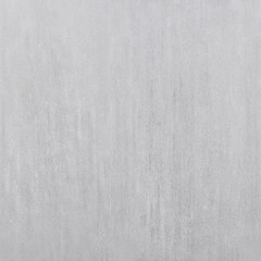 The unpainted wall of the house is grey .Texture or background