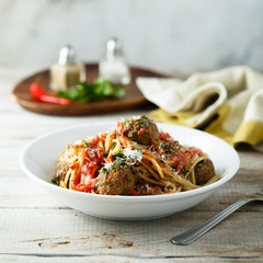 Homemade pasta with meatballs and tomato sauce