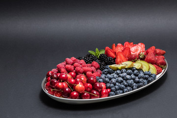 Mixed of color fruits. Sweet fruits and mixed berries.