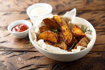 Roasted potato wedges with fresh rosemary
