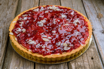 berry pie on wooden background