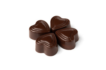 Chocolate sweets in heart shape isolated on white background.