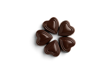 Chocolate sweets in heart shape isolated on white background.