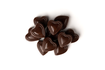Chocolate sweets in heart shape isolated on white background.