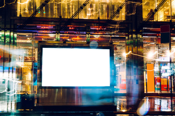 Billboard in rainy night with blank copy space screen for advertising or promotional publicity...