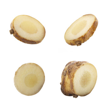 set of slices of fresh galangal root  isolated on white background