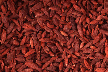 dried red goji berries background. top view