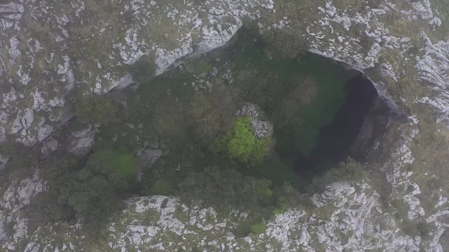 Aerial view of a sima in Mortero de Astrana, Astrana, Alto Ason, Soba Valley, Cantabria, Spain, Europe