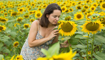 Girl in sunflowers field