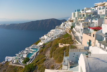 Traditional whitewashed buildings on a cliff of Santorini Island, Cyclades, Greece.