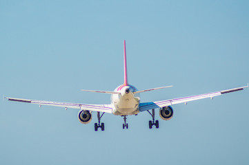 Plane taking off in Barcelona airport el Prat Josep Tarradellas, Catalonia, Spain.