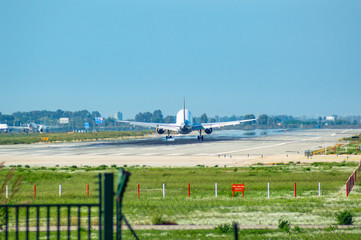 Fototapeta premium Plane taking off in Barcelona airport el Prat Josep Tarradellas, Catalonia, Spain.