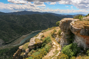 Mountain rocks and clouds