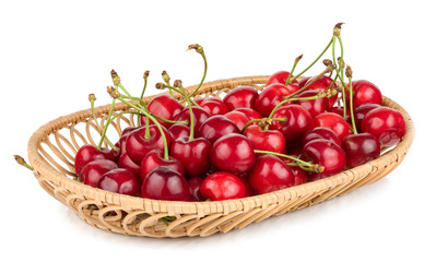 Cherries in basket isolated on white