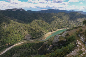 Obraz premium Mountain rocks and clouds