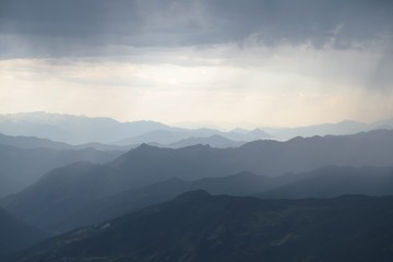 Naklejka na ściany i meble beautiful dark blue mountain landscape with fog and forest.artvin/turkey